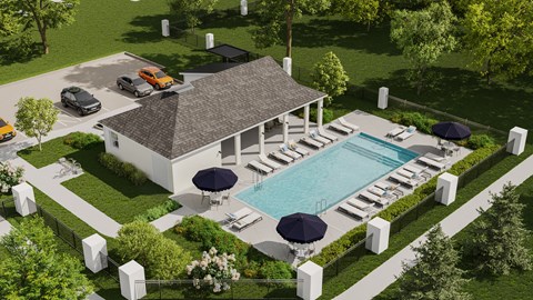 A pool with lounge chairs and umbrellas is surrounded by a white fence and greenery.